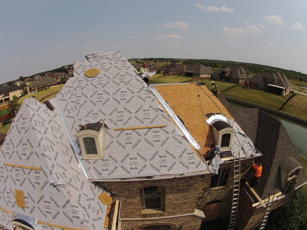 Aerial view of the Golden Hammer award-winning roof replacement in progress, photo 8 of 9