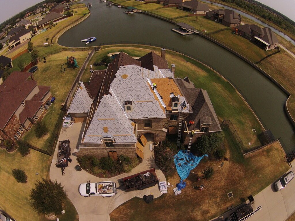 Aerial view of the Golden Hammer award-winning roof replacement in progress, photo 3 of 9
