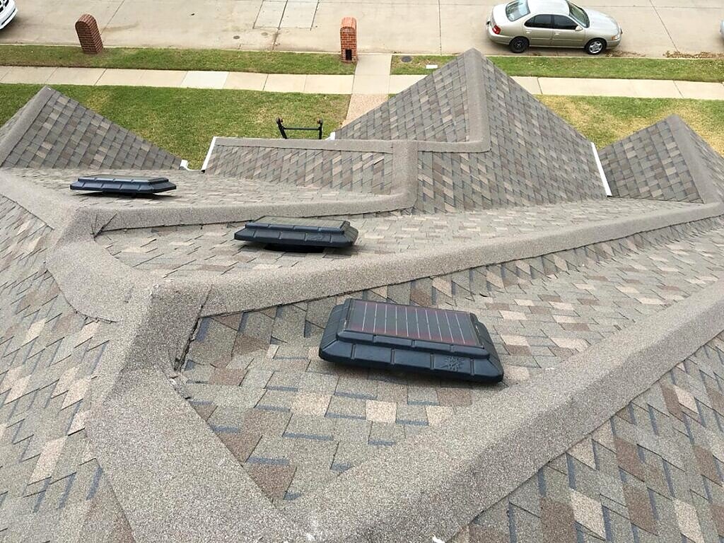 Plano roofing project — roof slopes and vents