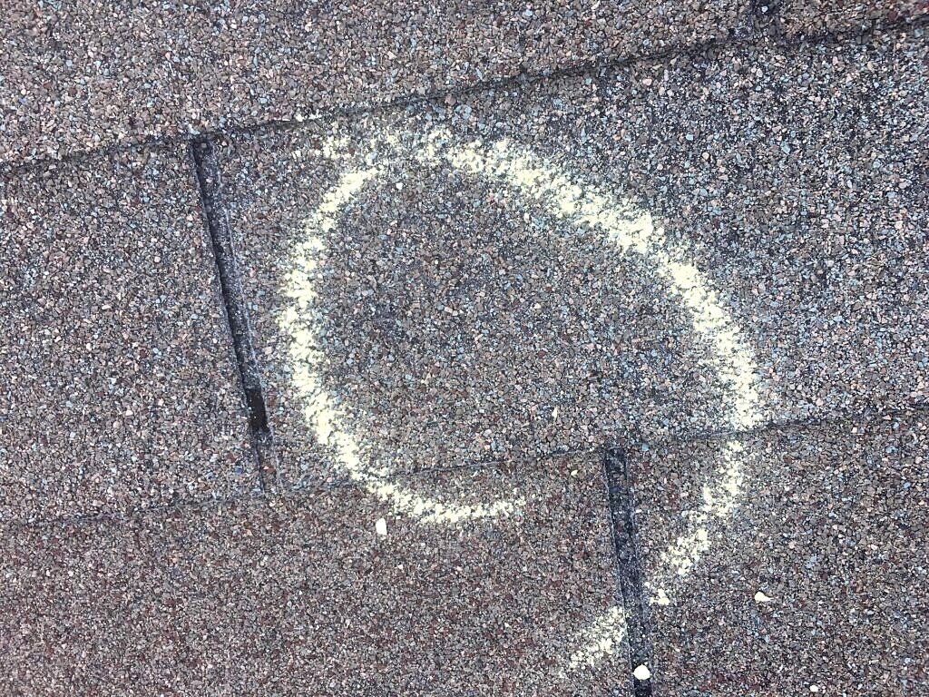 Dallas roof inspection — marked shingle condition