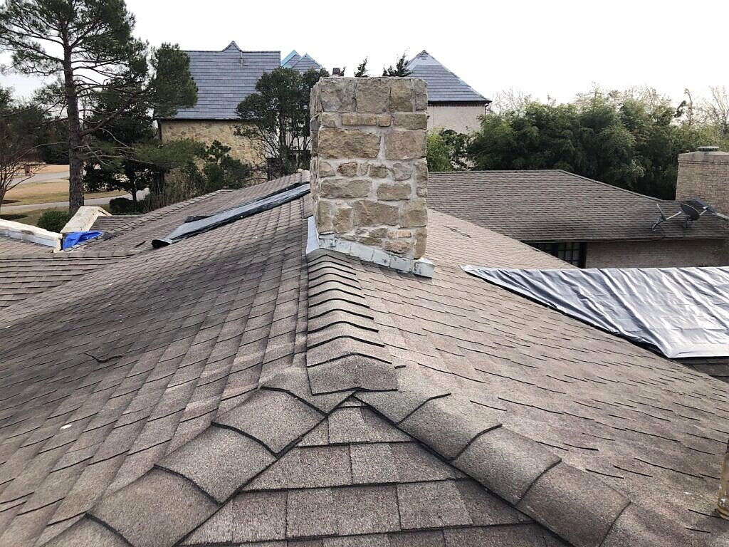 Dallas roof project — chimney and ridge detail