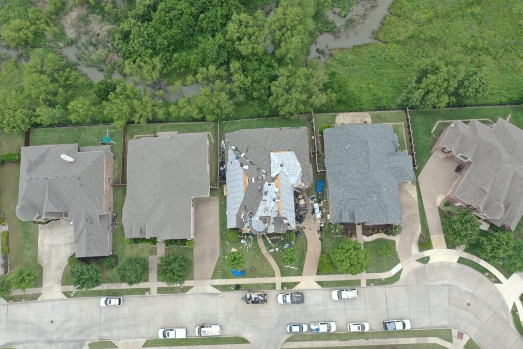 Aerial view of a Dallas-Fort Worth neighborhood during a Roofing Giant roof replacement