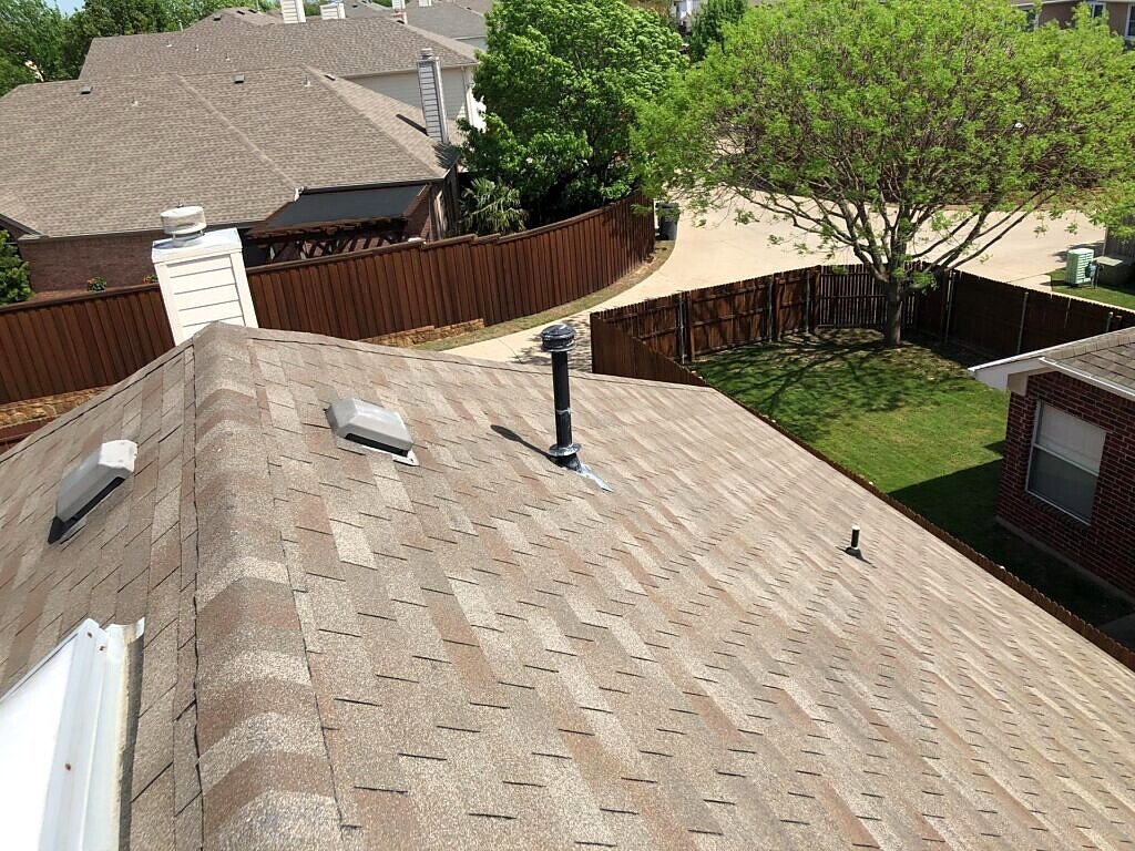 April 2019. Existing shingles, vents and skylight at the Allen inspection.