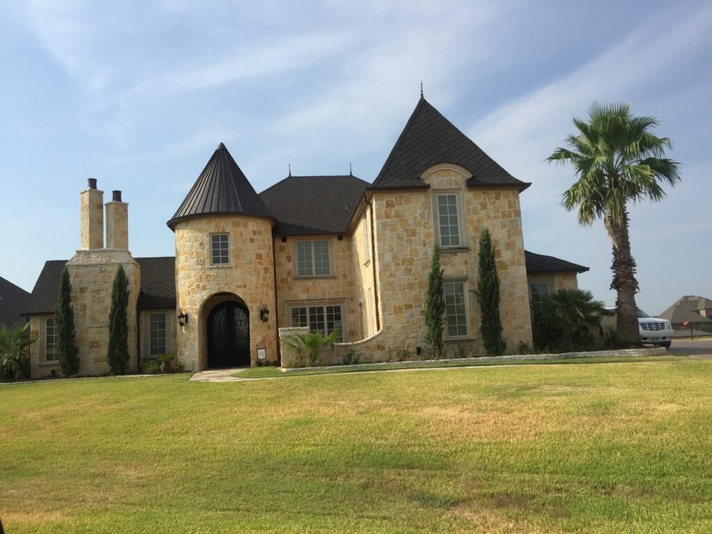Completed roof replacement on a custom home with multiple gables