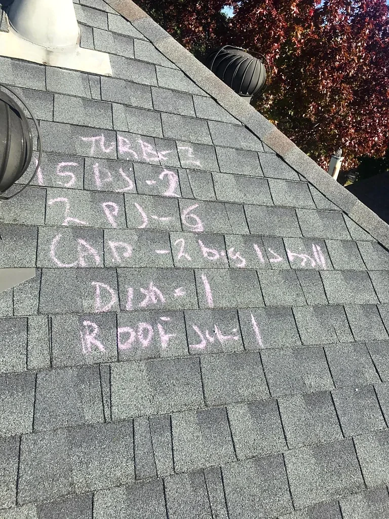 Component notes marked on the existing roof.