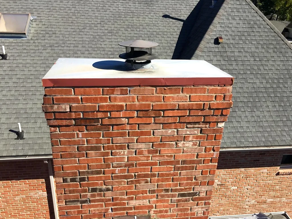 Chimney cap and masonry detail.