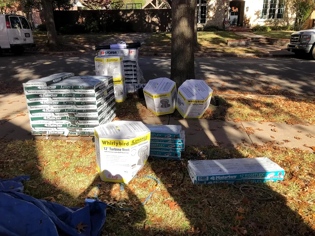 Malarkey roofing materials staged at the property.