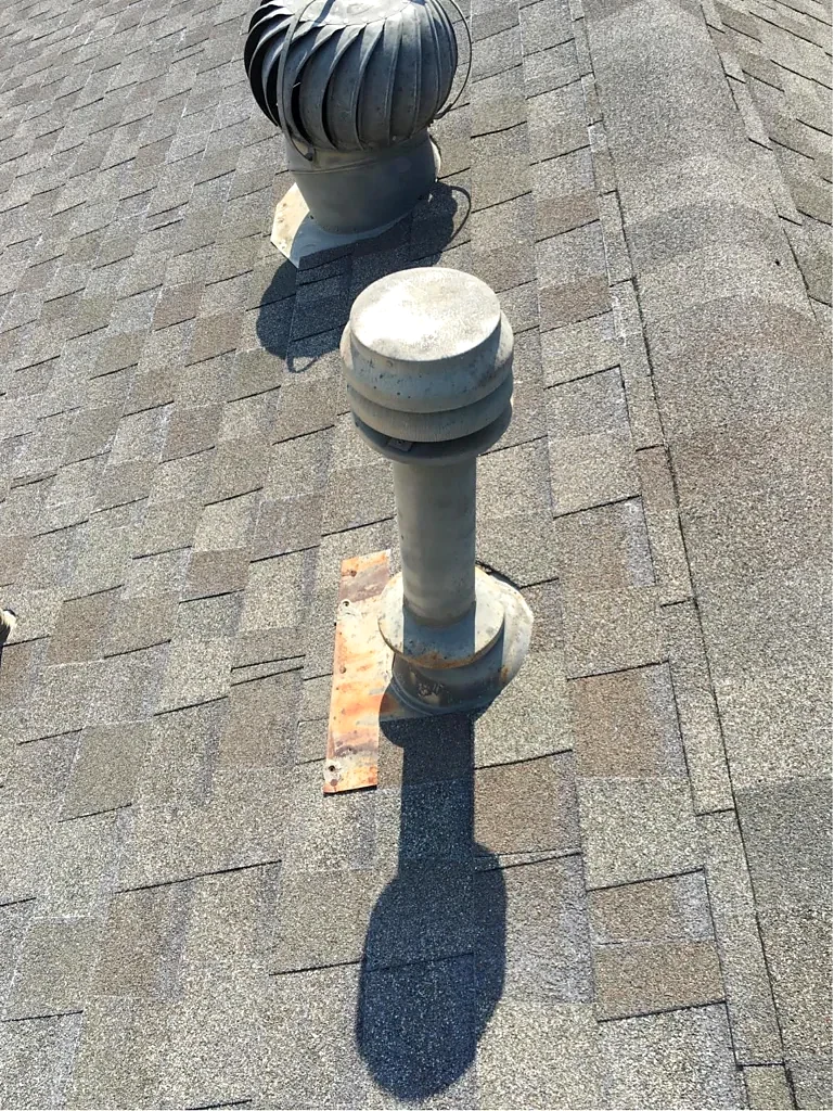 Turbine vent and flue penetration before work.