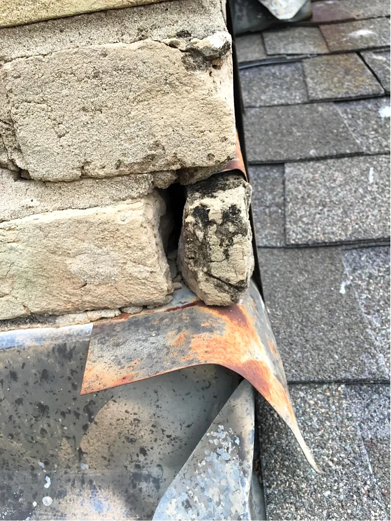 Chimney masonry and flashing detail.
