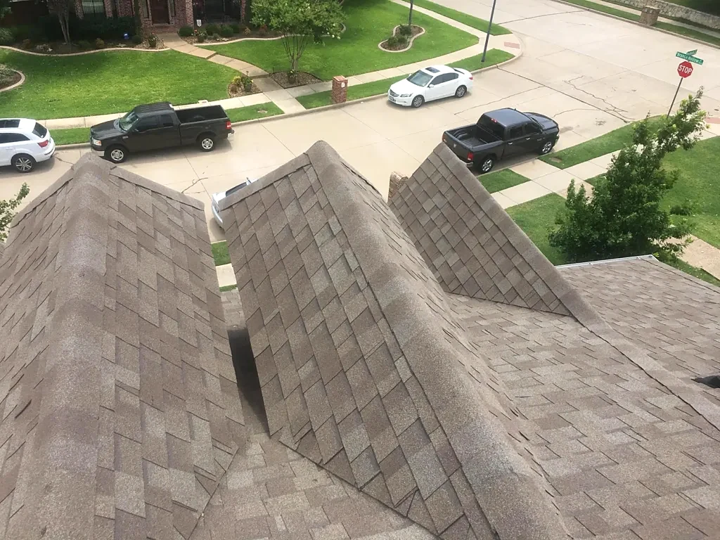 Multiple roof planes and valleys before work.