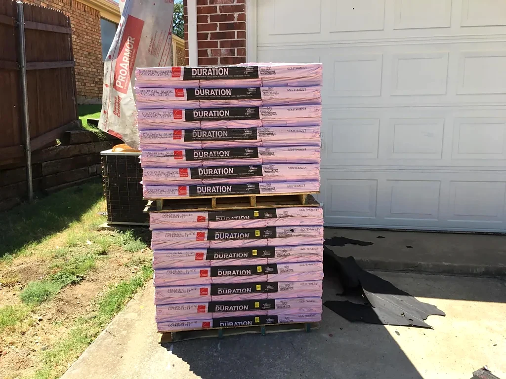 Owens Corning shingle bundles delivered for the project.