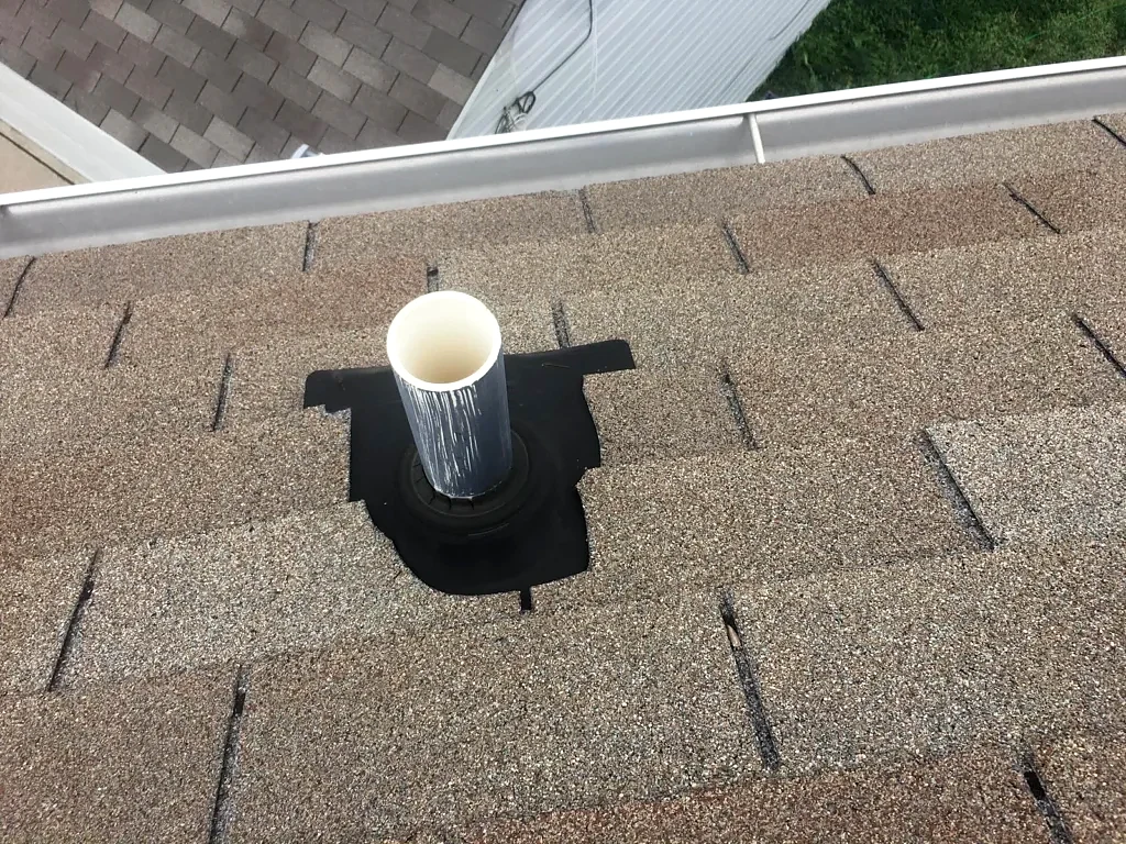 Plumbing penetration and surrounding shingles.