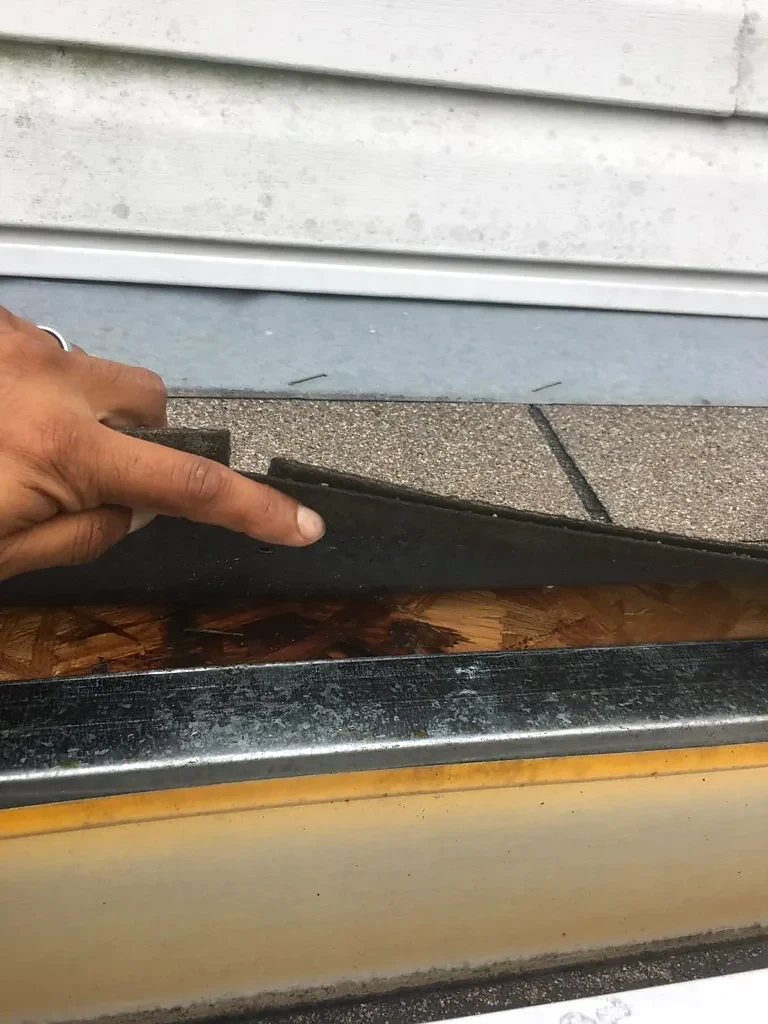 Roof-edge connection opened for inspection.