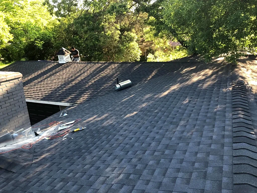 Multiple roof planes and vent details.