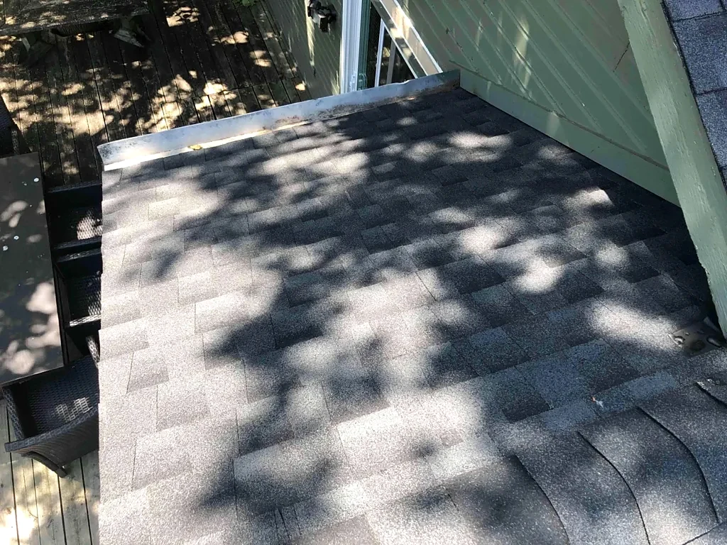 Shingle roof section after installation.