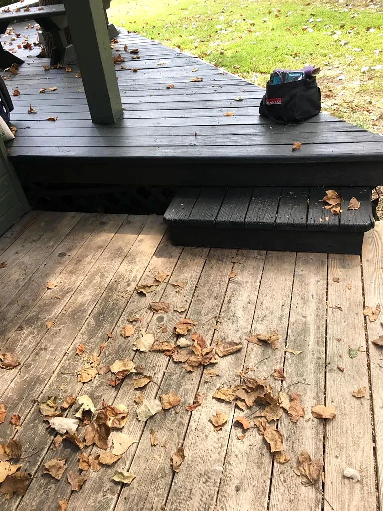 Roofing and deck junction documented during follow-up.