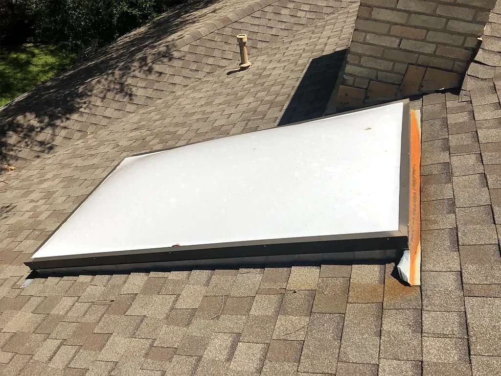 Skylight and shingles during the inspection.