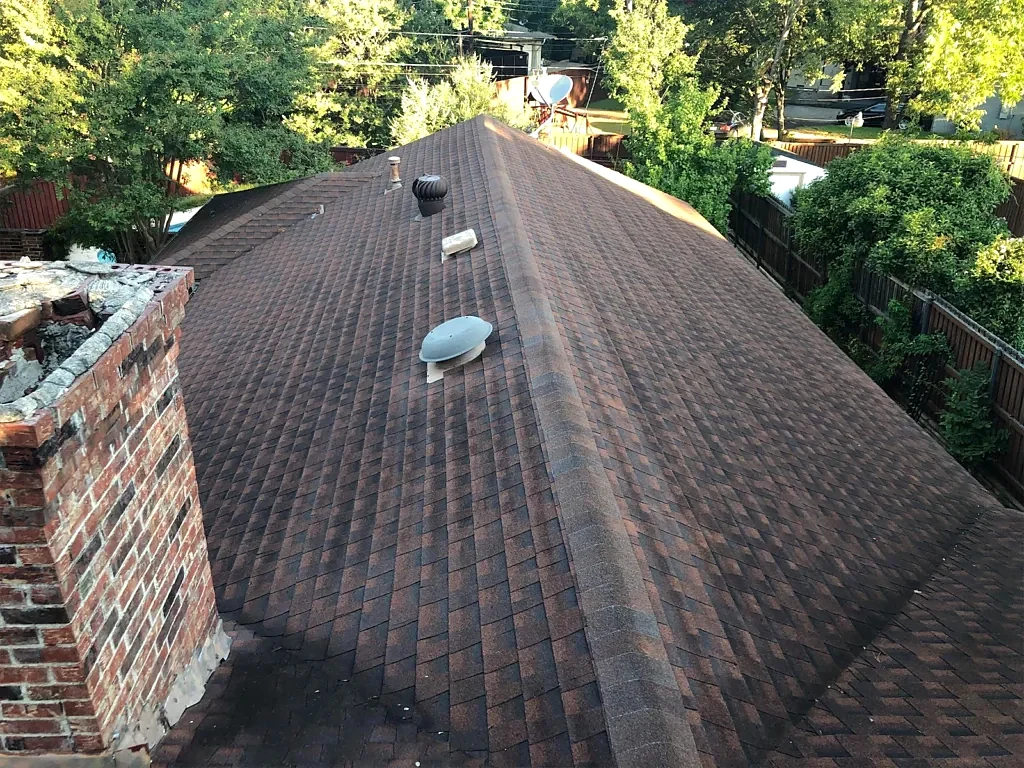 Existing roof slope and ventilation before replacement.