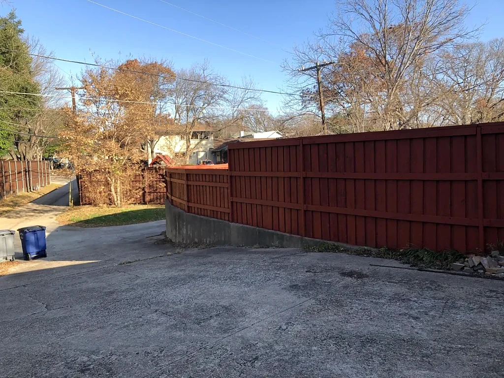 Fence work documented alongside the roof project.