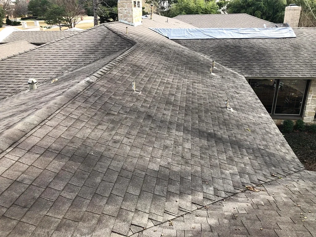 Existing roof slopes documented before replacement.