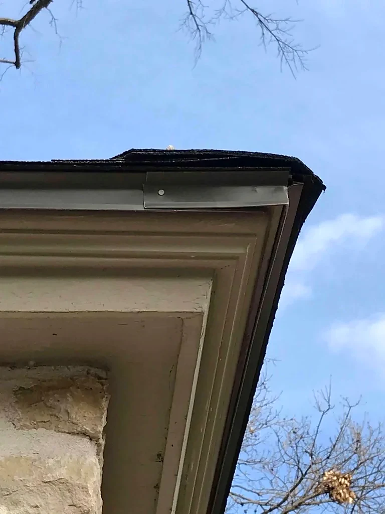 Roof-edge and trim detail after the main installation.