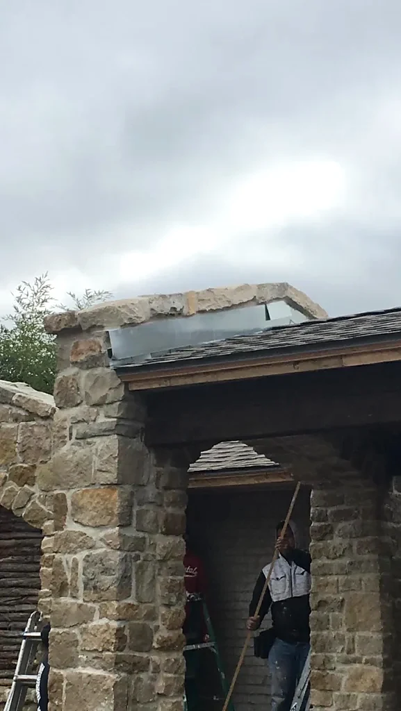 Roof and masonry transition in the follow-up photographs.