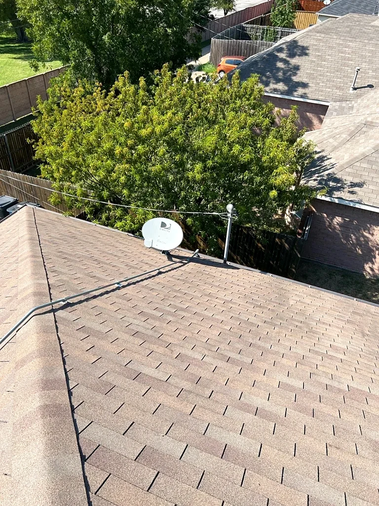 Ridge and adjoining roof planes before replacement.