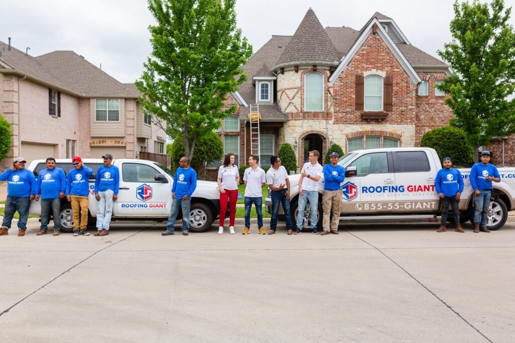 Roofing Giant roofing crew group photo in front of a Dallas-area home