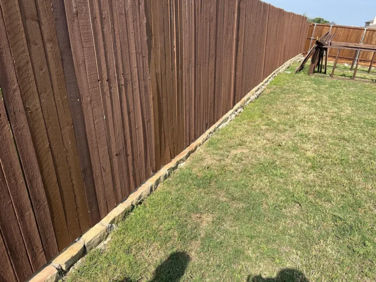 Wood fence documented in the Little Elm project inspection record.